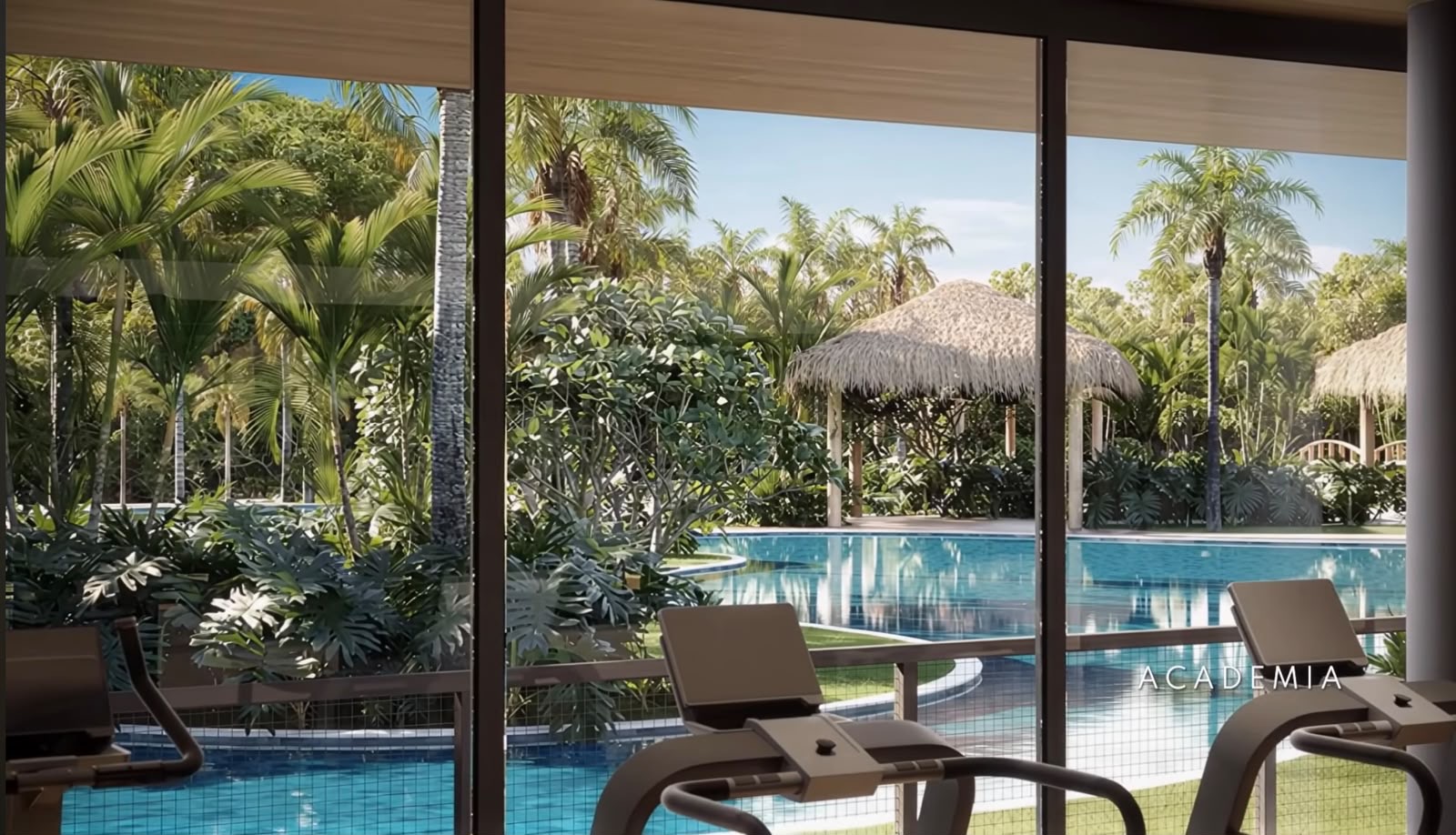 Academia com vista para piscina e jardim